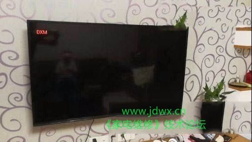 PPTV 55VU4液晶电视更换主板后左上角显示DXM字样的解除
