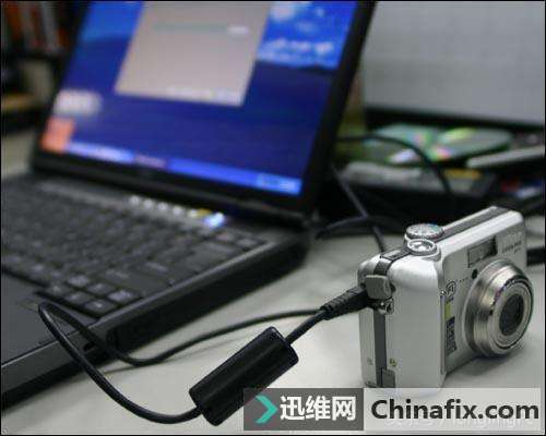 如何将拍照机中的图片导入电脑？