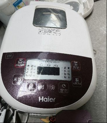 海尔IH电磁电饭煲显示E9故障的检修